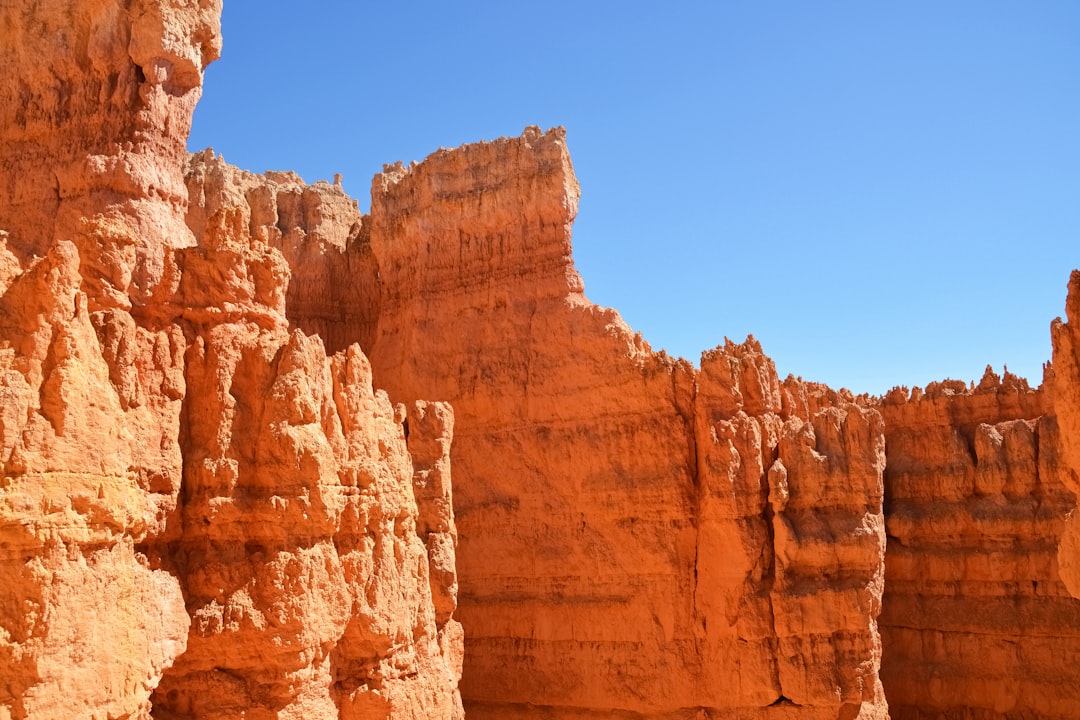 brown rock formation under blue sky during daytime