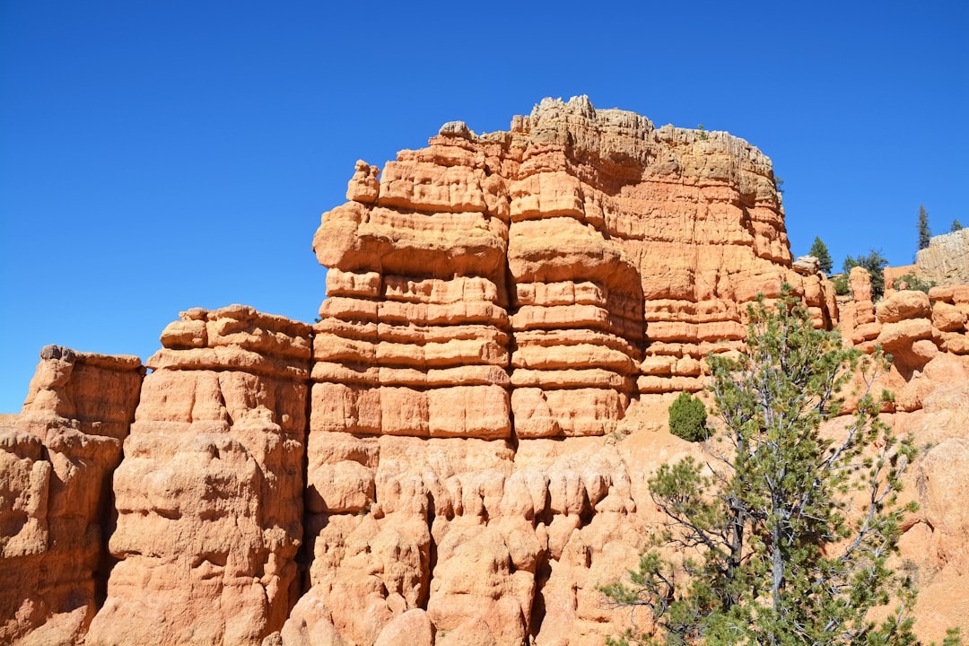 brown rock formation under blue sky during daytime