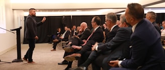 people sitting on chair inside room