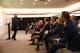 people sitting on chair inside room