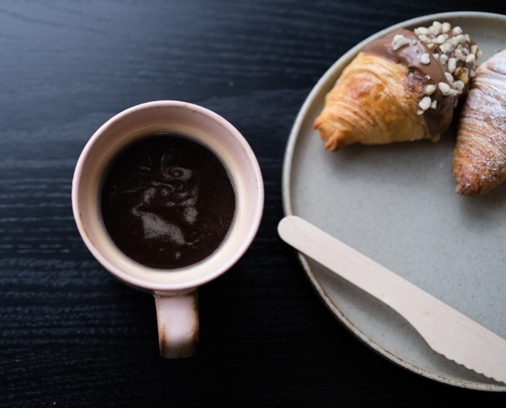 white ceramic mug with coffee