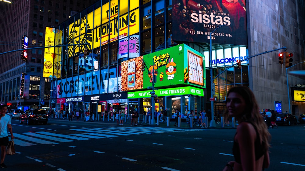 people walking on street during nighttime