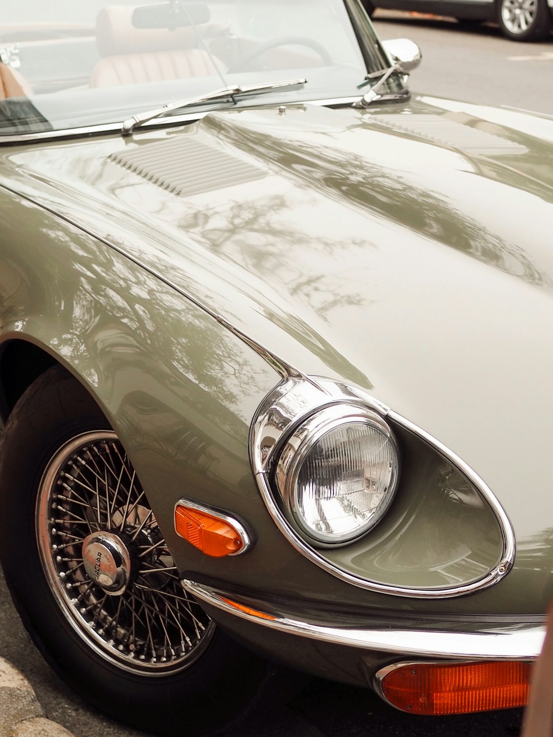 white car with chrome wheel