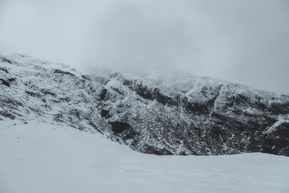 snow covered mountain during daytime