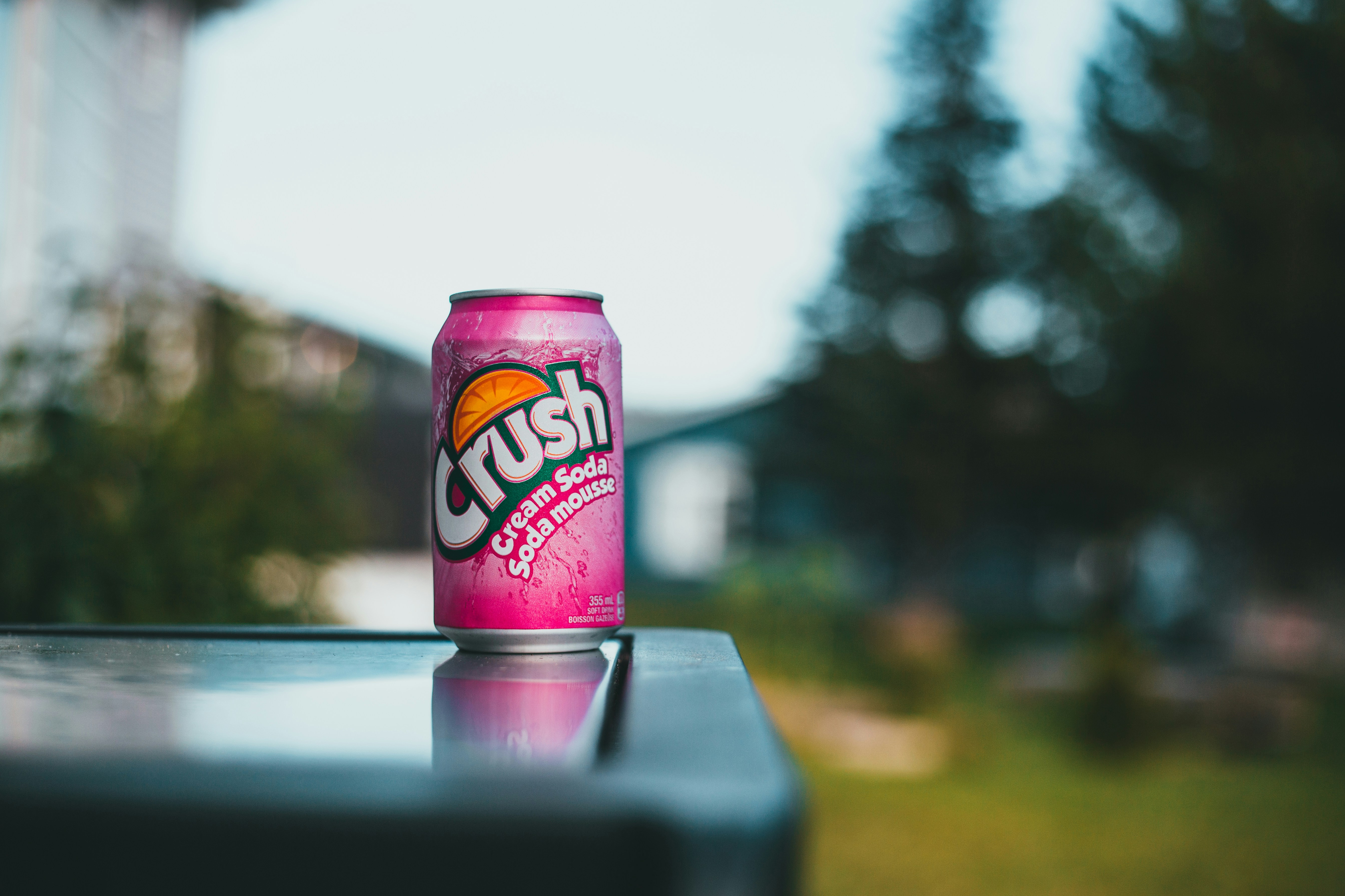 Crush strawberry soda can in pink and red
