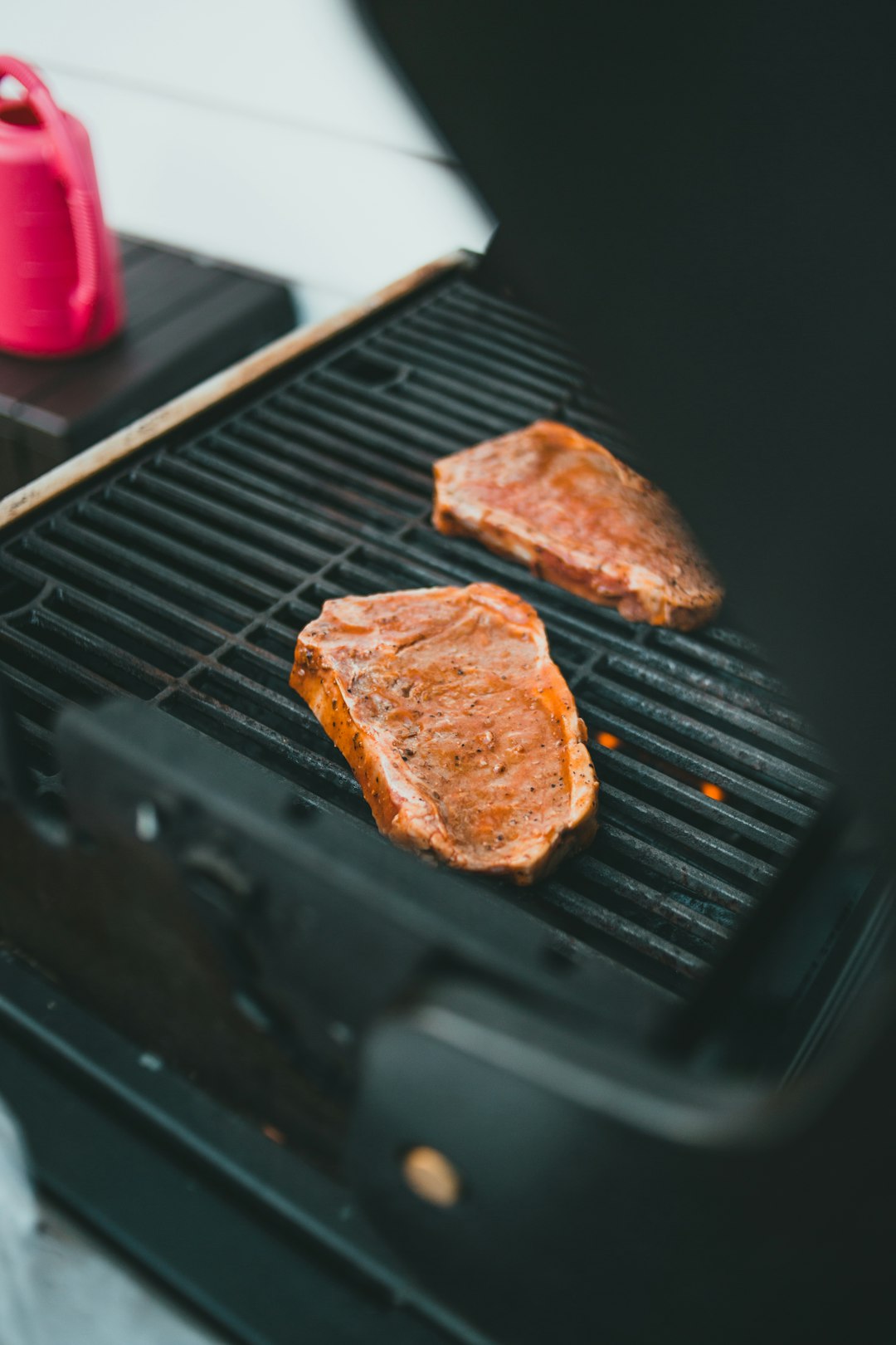 brown meat on black grill