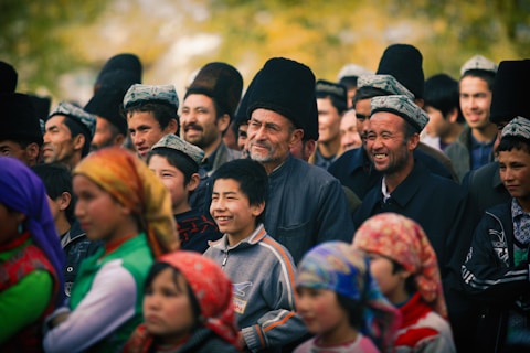 group of people in black and red shirts