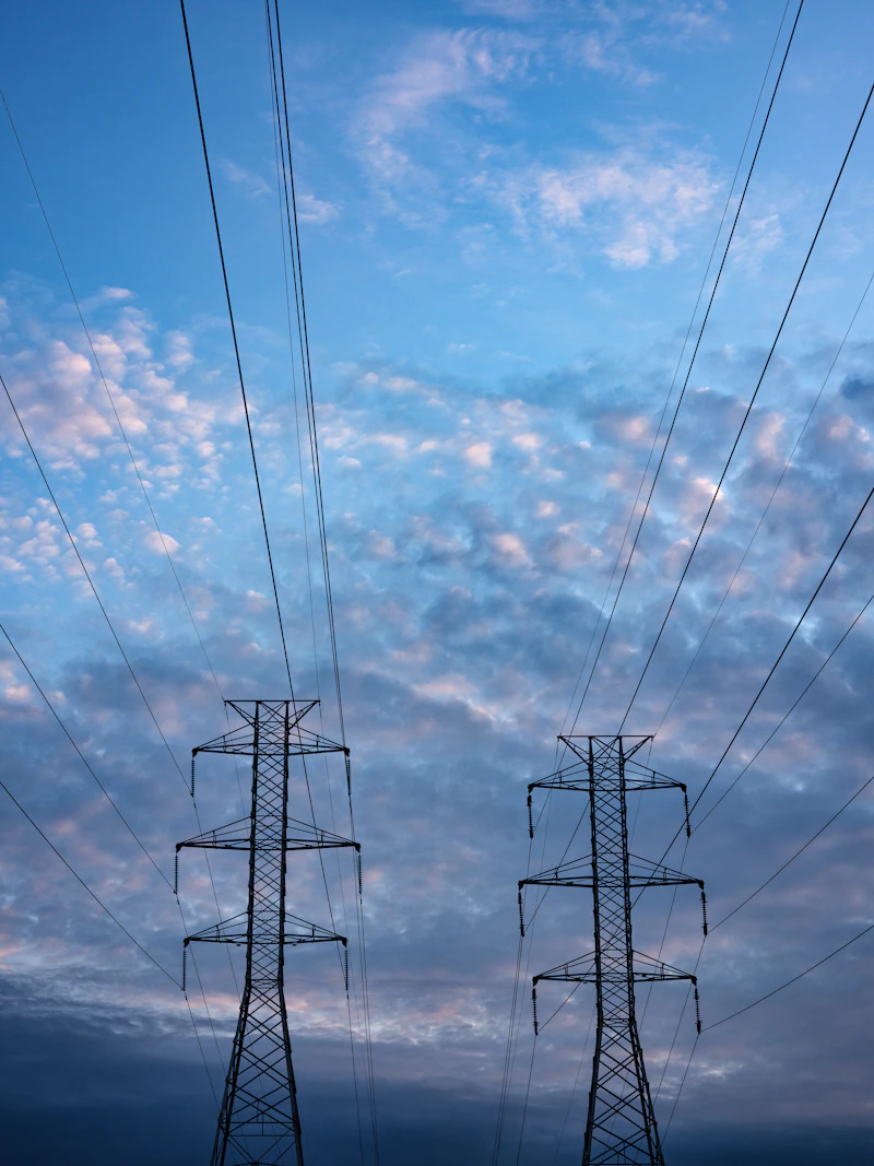 Electric tower under blue sky