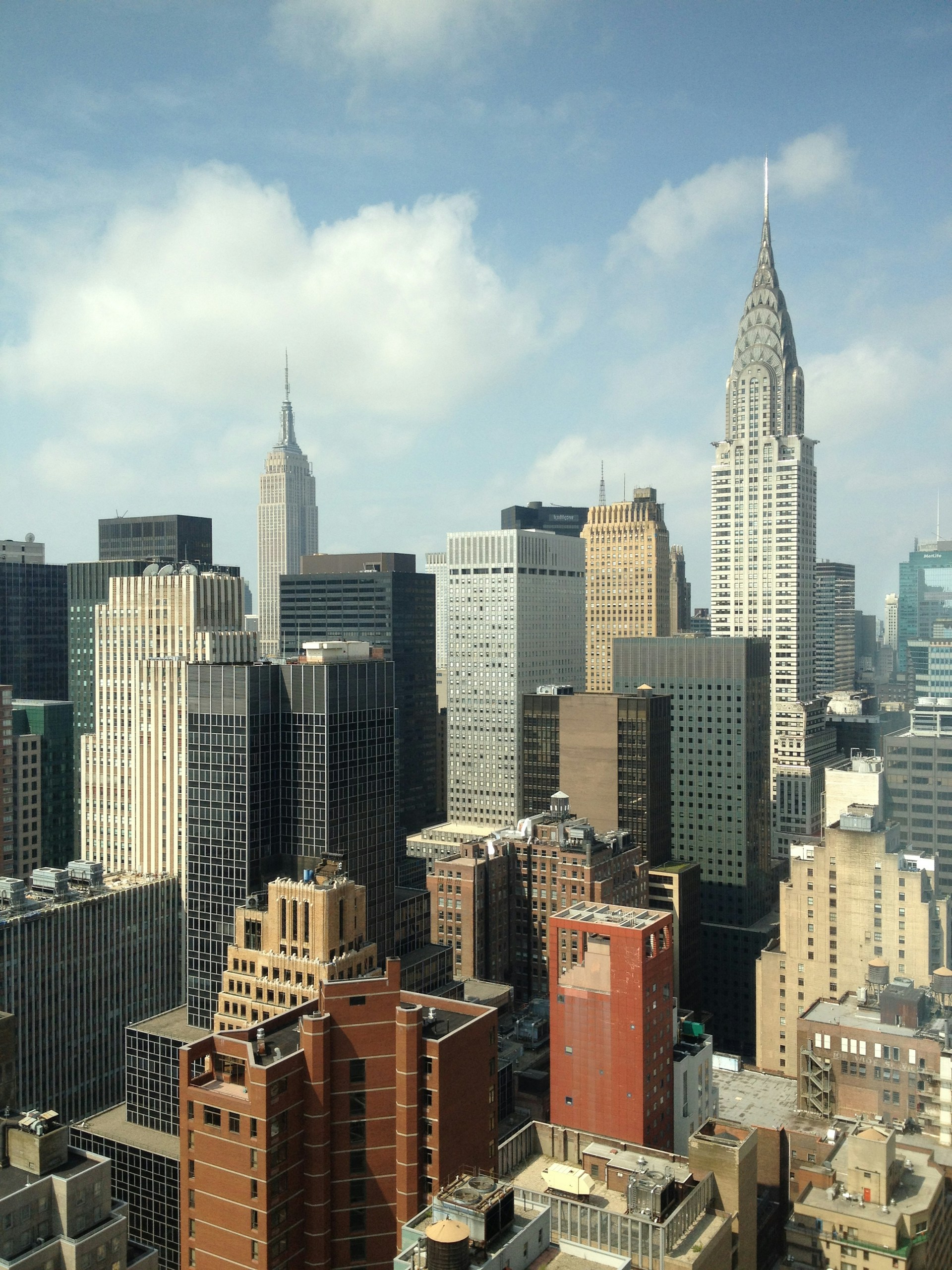 high rise buildings under blue sky during daytime