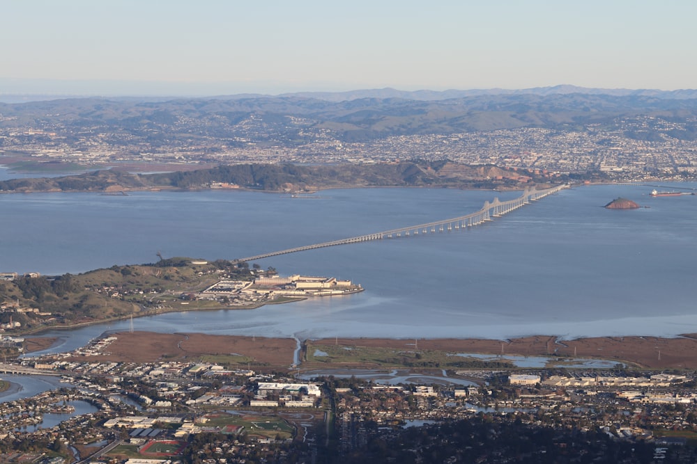 aerial view of city near body of water during daytime