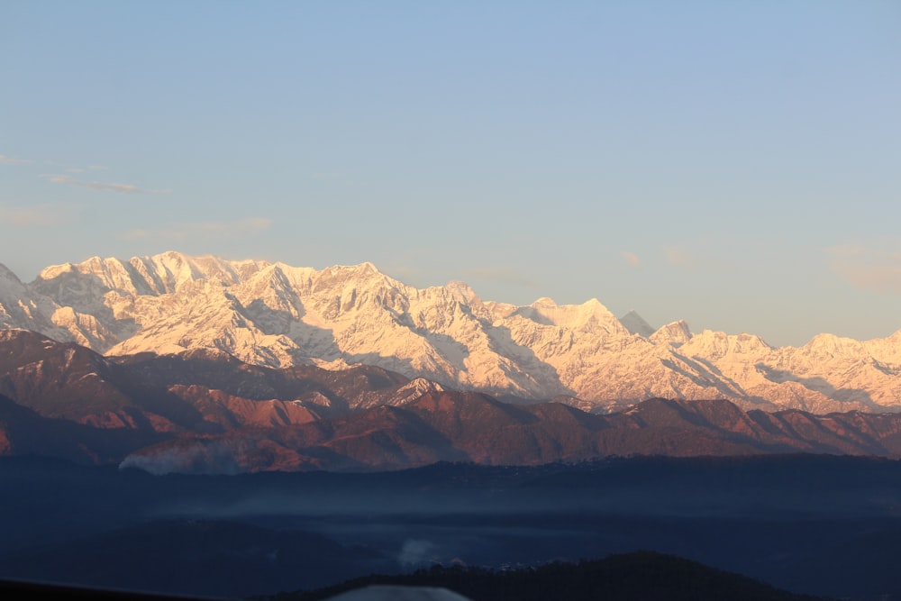 snow covered mountains during daytime