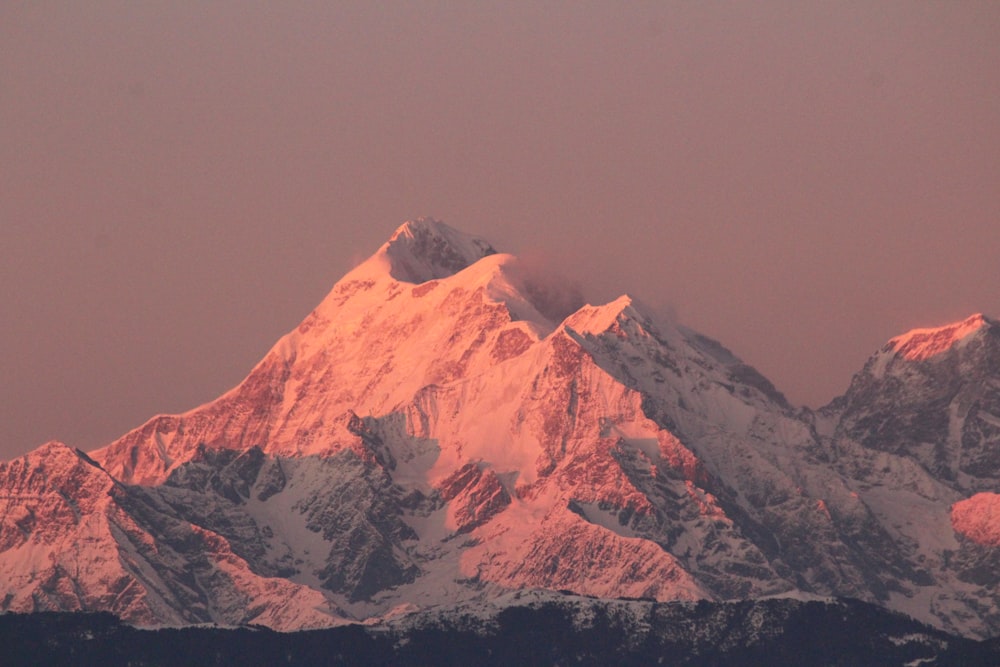 snow covered mountain during daytime