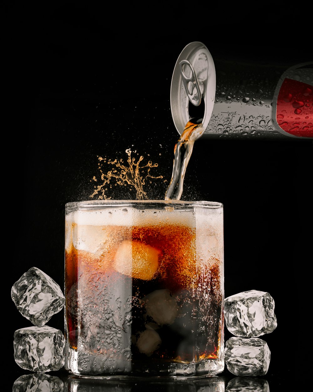 clear drinking glass with brown liquid