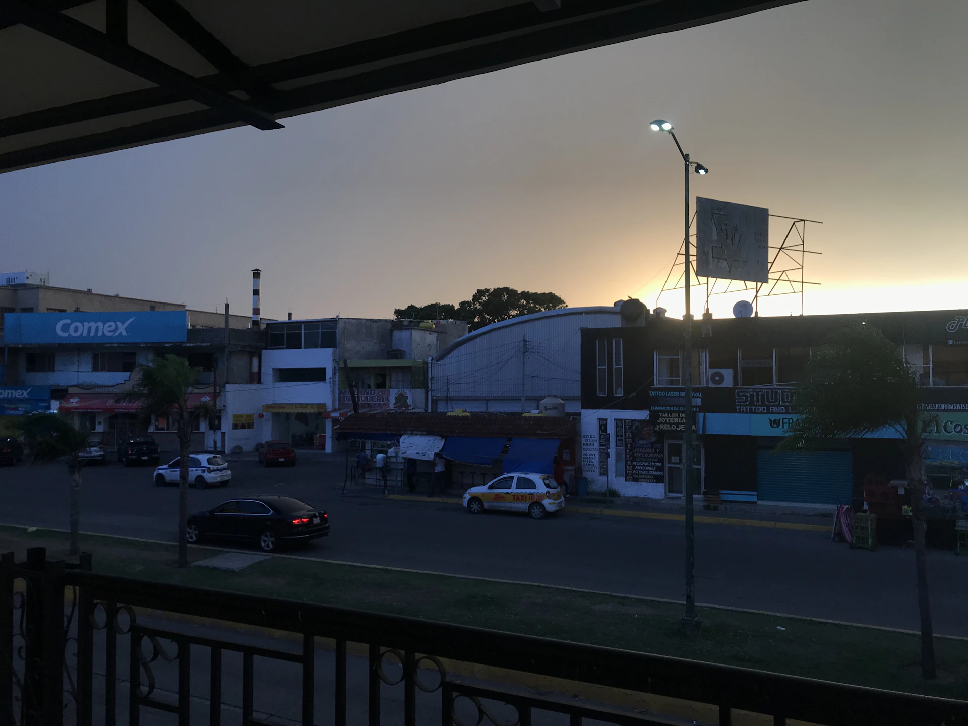 woman wearing yellow long-sleeved dress under white clouds and blue sky during daytime