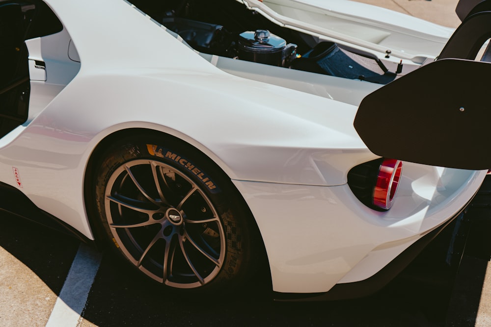 white car with black wheel