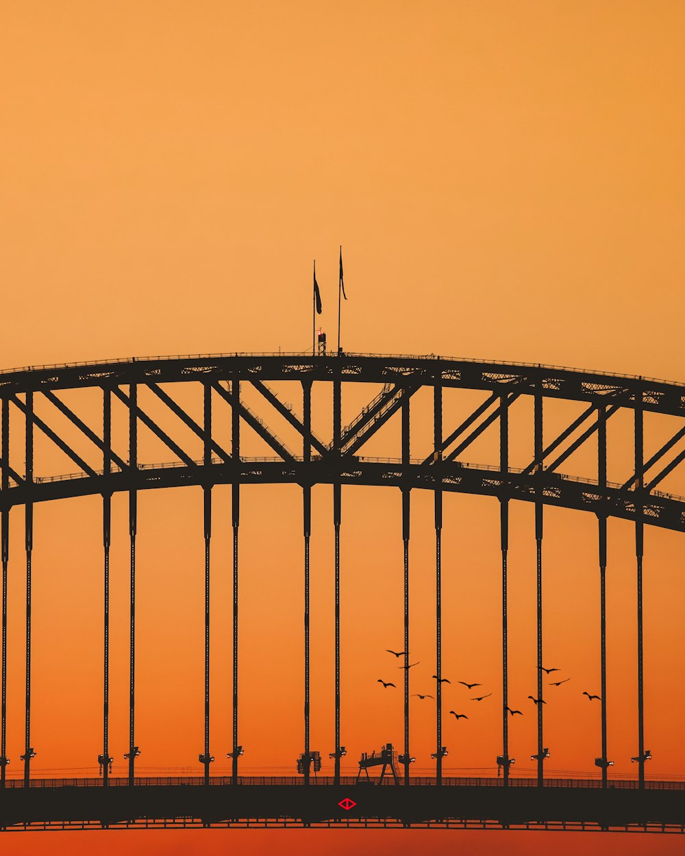 silhouette of bridge during sunset