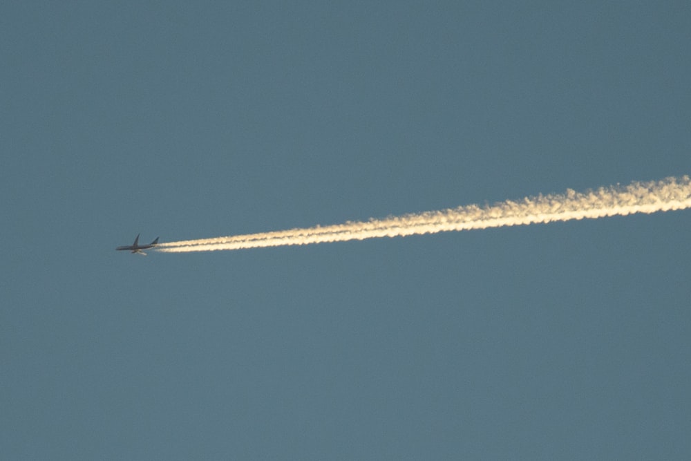 white plane in the sky