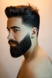 topless man with black beard