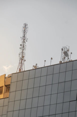A modern commercial building with visible network infrastructure elements integrated.