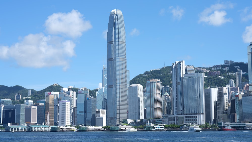 white high rise building near body of water during daytime