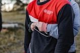 man in black and red long sleeve shirt