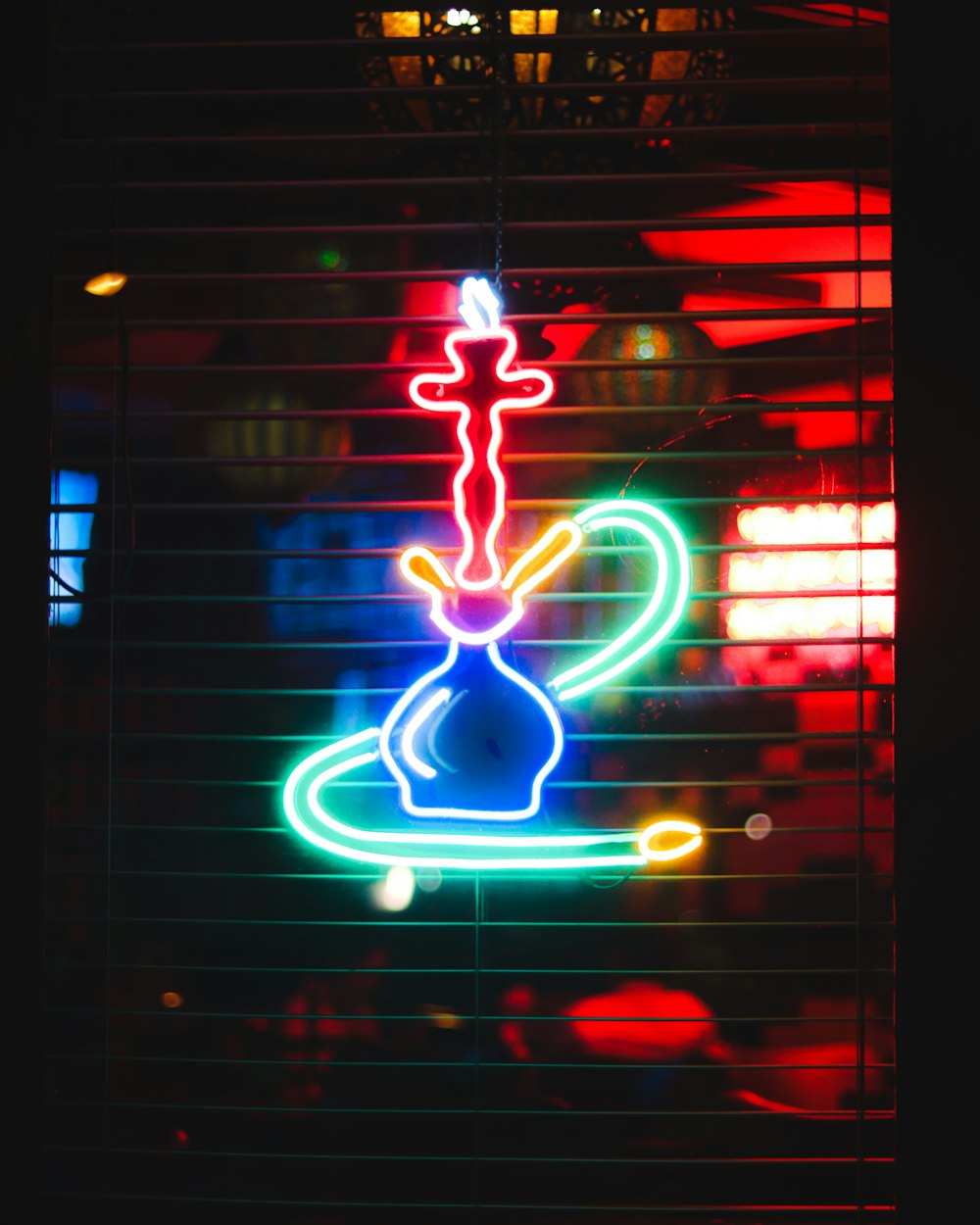 red green and blue neon light signage