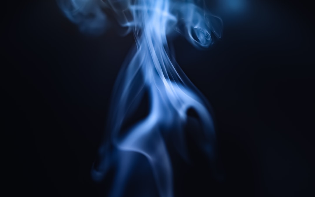 white smoke in black background