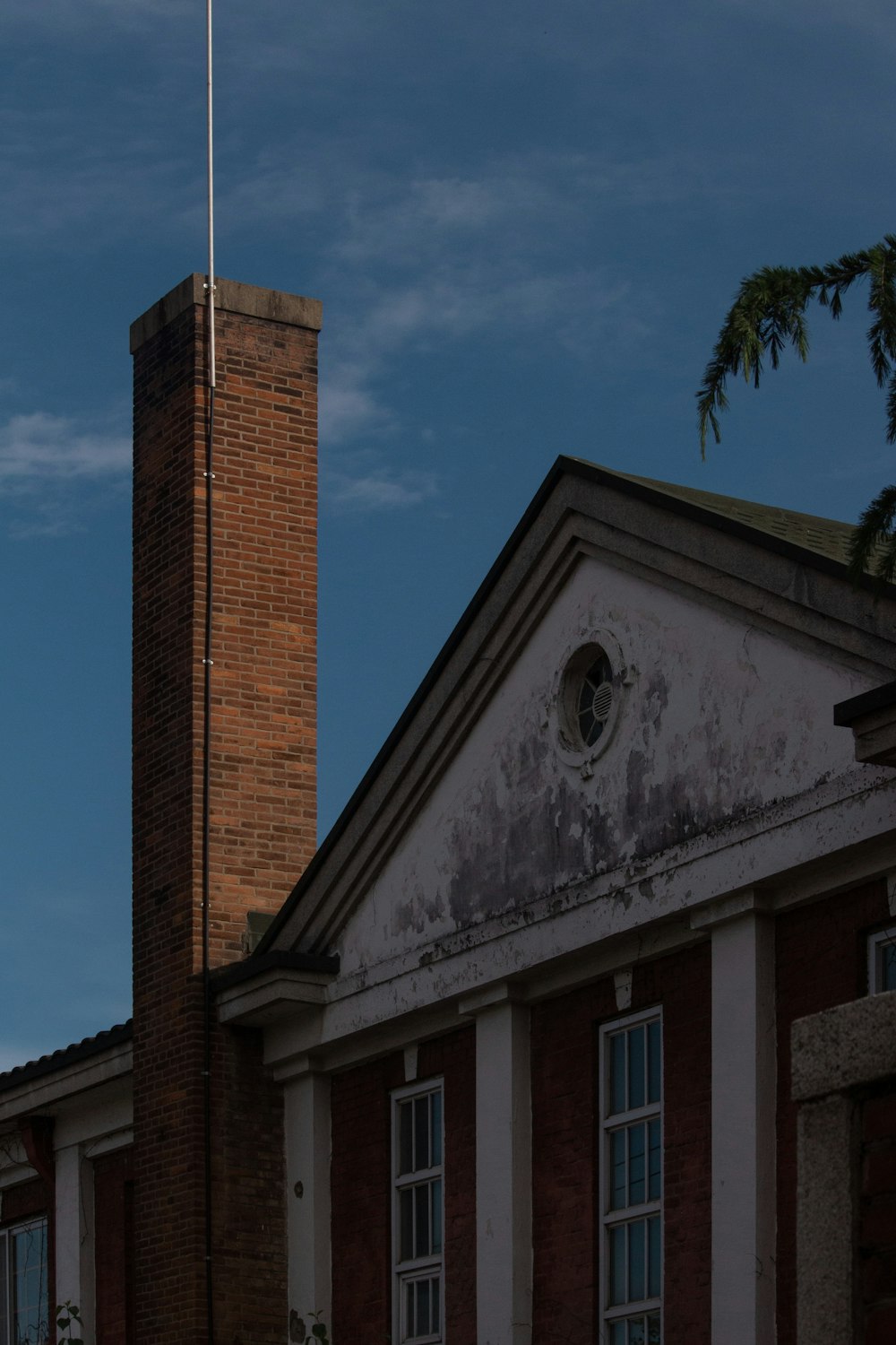 brown brick building under blue sky during daytime