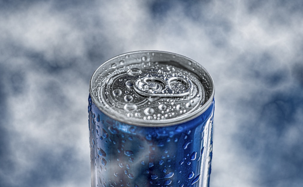 Close-up of a chilled energy drink can with condensation