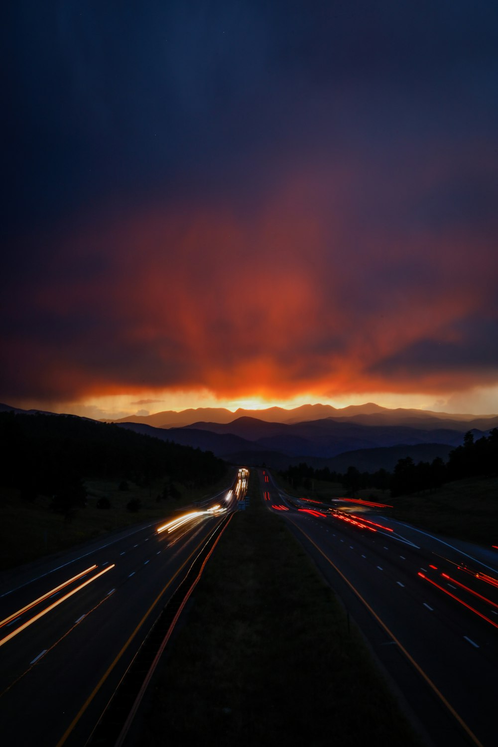 time lapse photography of cars on road during sunset