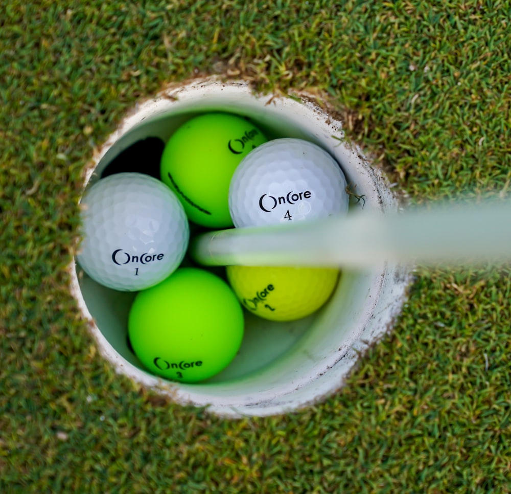 white golf ball on green grass