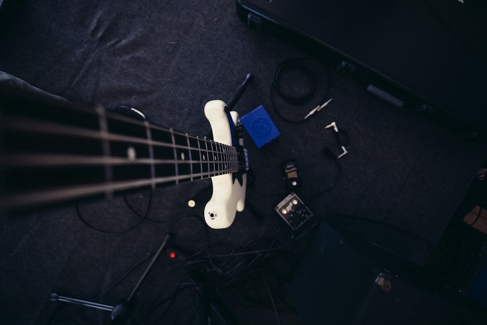 white and black electric guitar