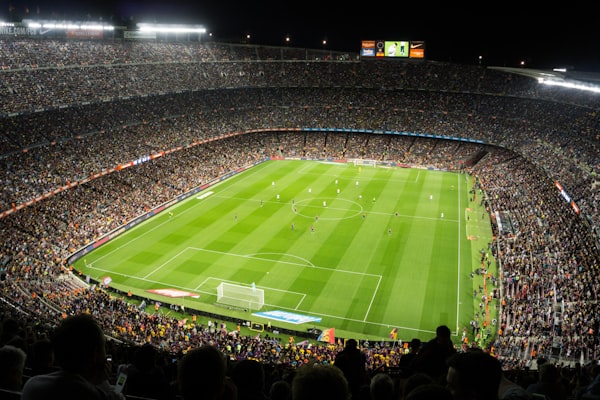 Soccer stadium filled with fans during a major football match