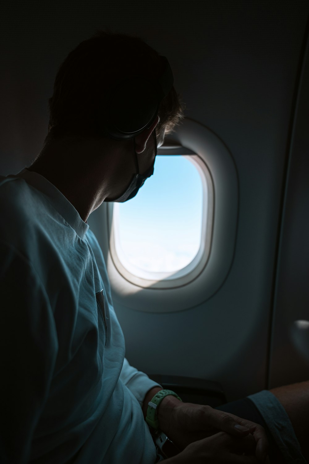 man in white dress shirt wearing black sunglasses