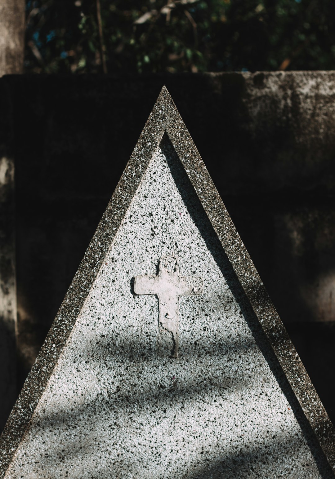 gray concrete cross with cross