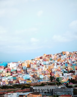 city buildings under blue sky during daytime