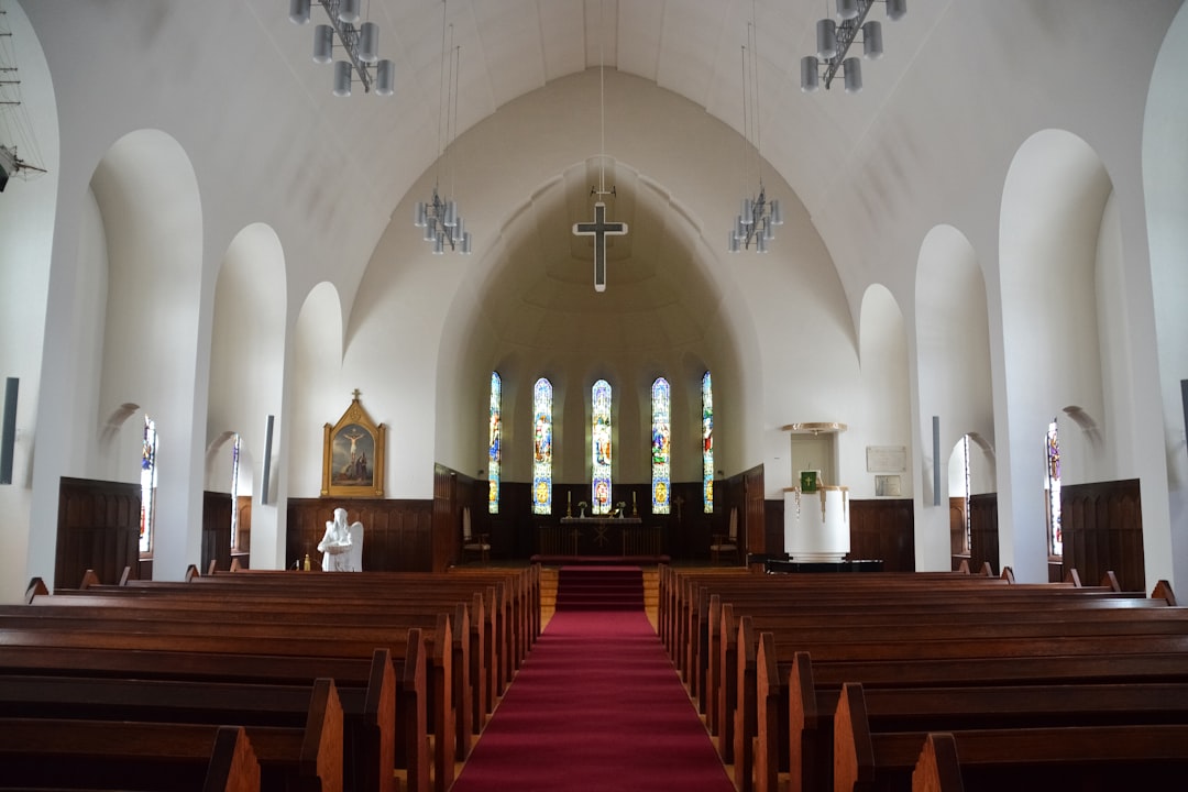 church interior with brown wooden chairs
