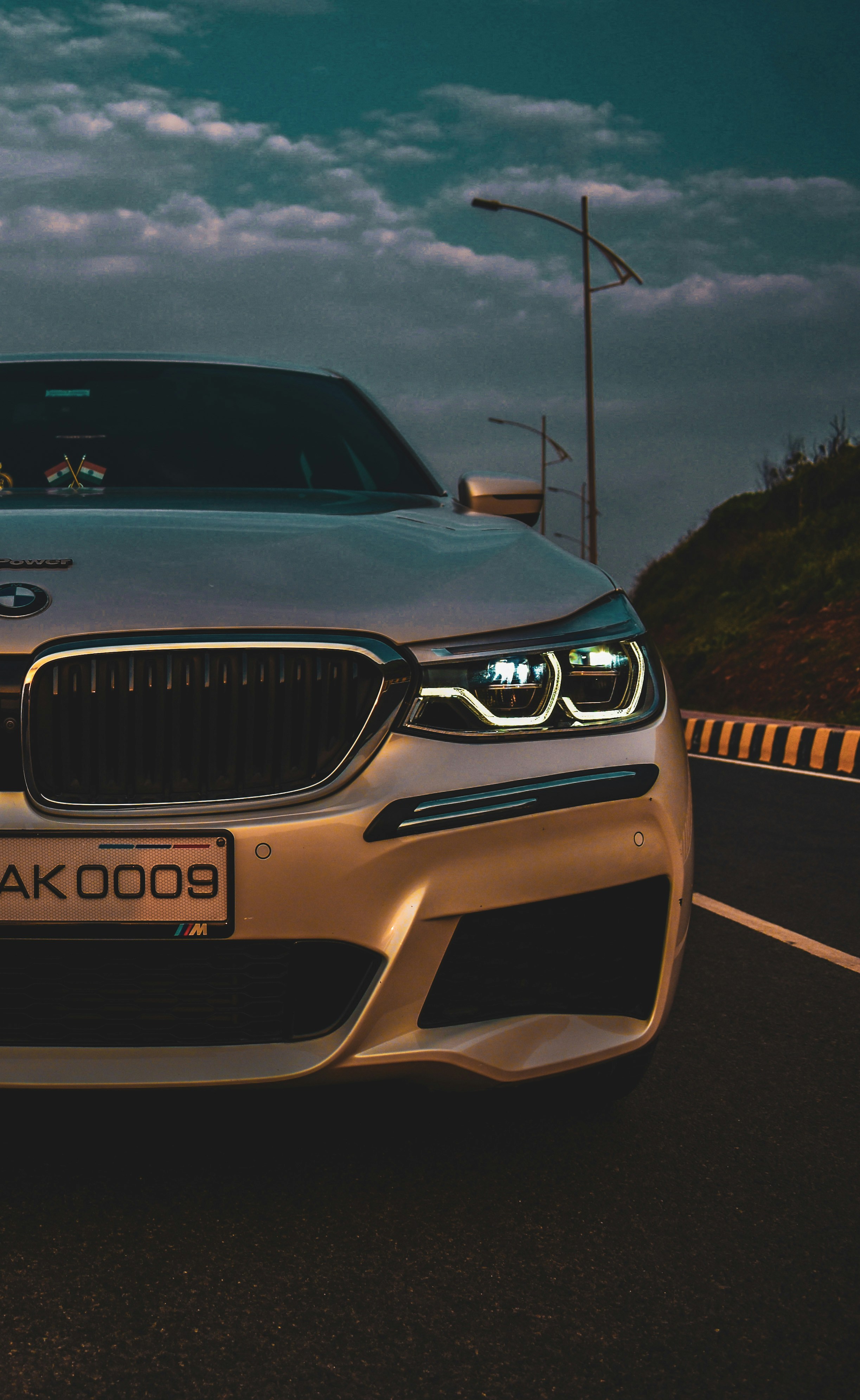 Black Bmw Car On Road During Night Time Photo Free Automobile Image On Unsplash