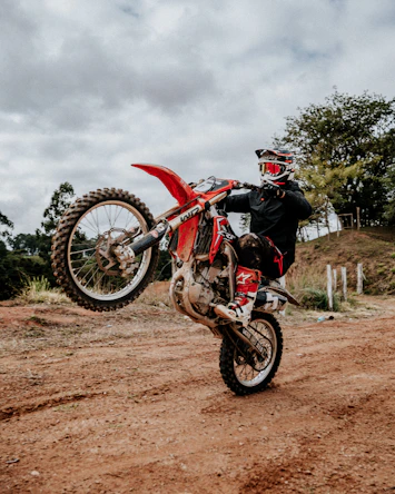 red and black motocross dirt bike