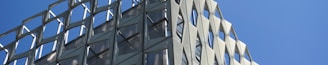 white concrete building under blue sky during daytime