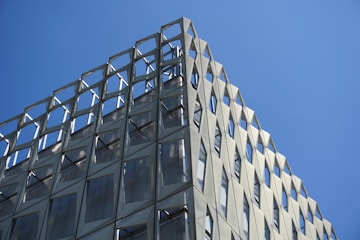 white concrete building under blue sky during daytime