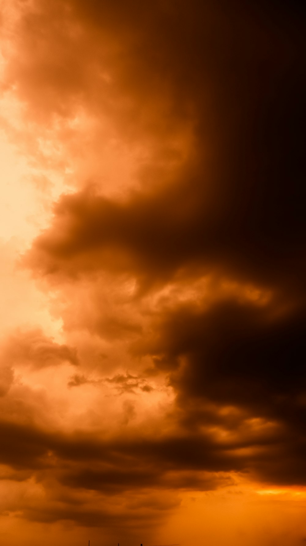 black clouds and blue sky