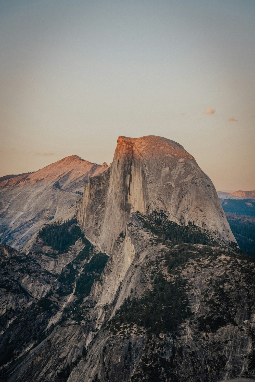 brown rocky mountain under white sky during daytime