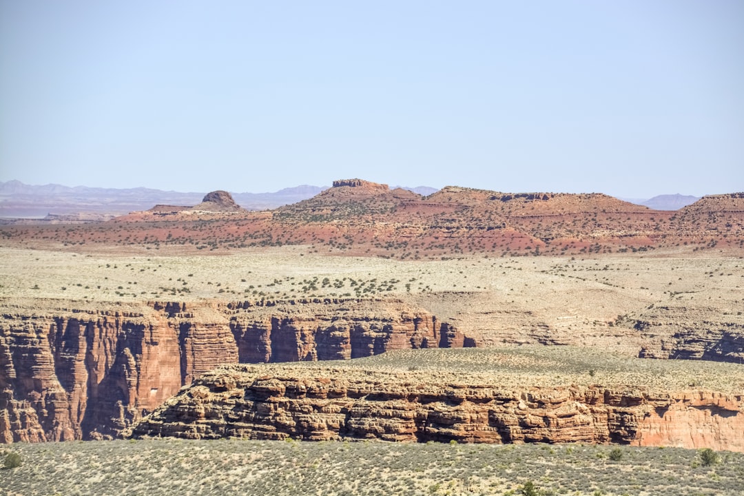 brown rock formation under blue sky during daytime