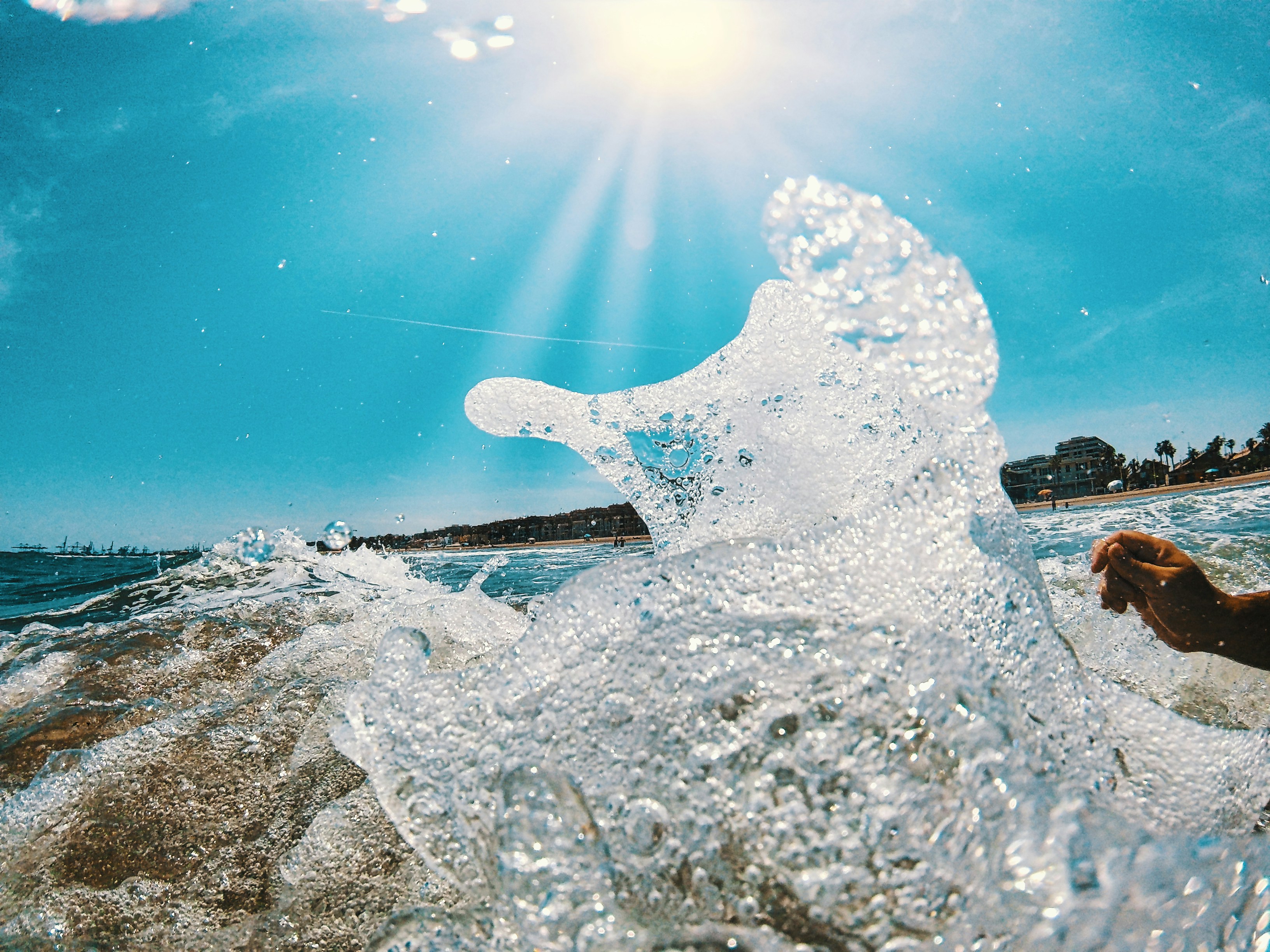white ice on gray rock during daytime, 