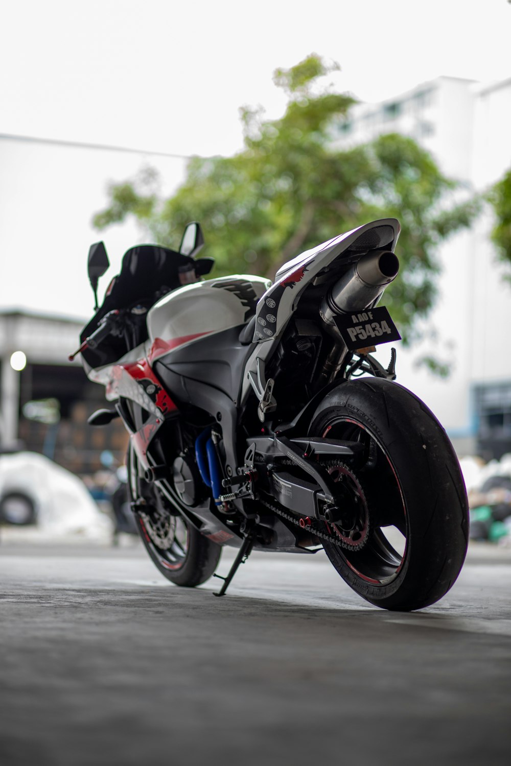 black and white sports bike on road during daytime