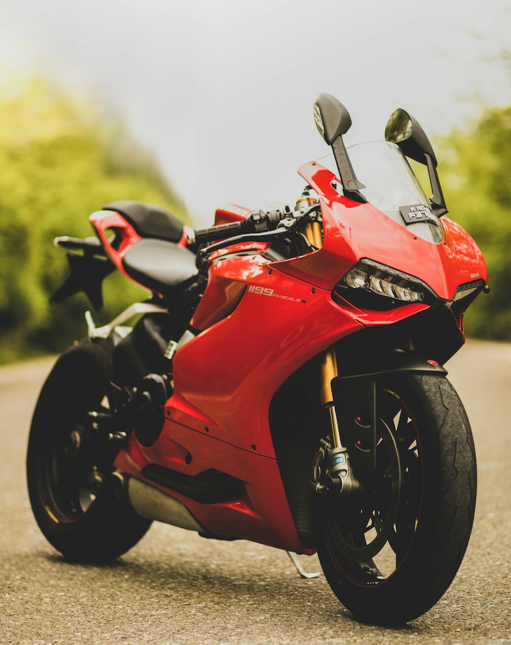 red and black sports bike