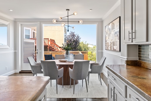 brown wooden table with chairs
