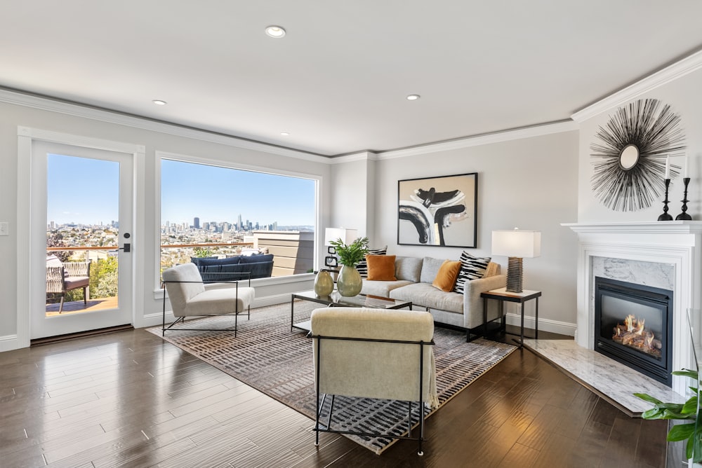 white sofa near glass window