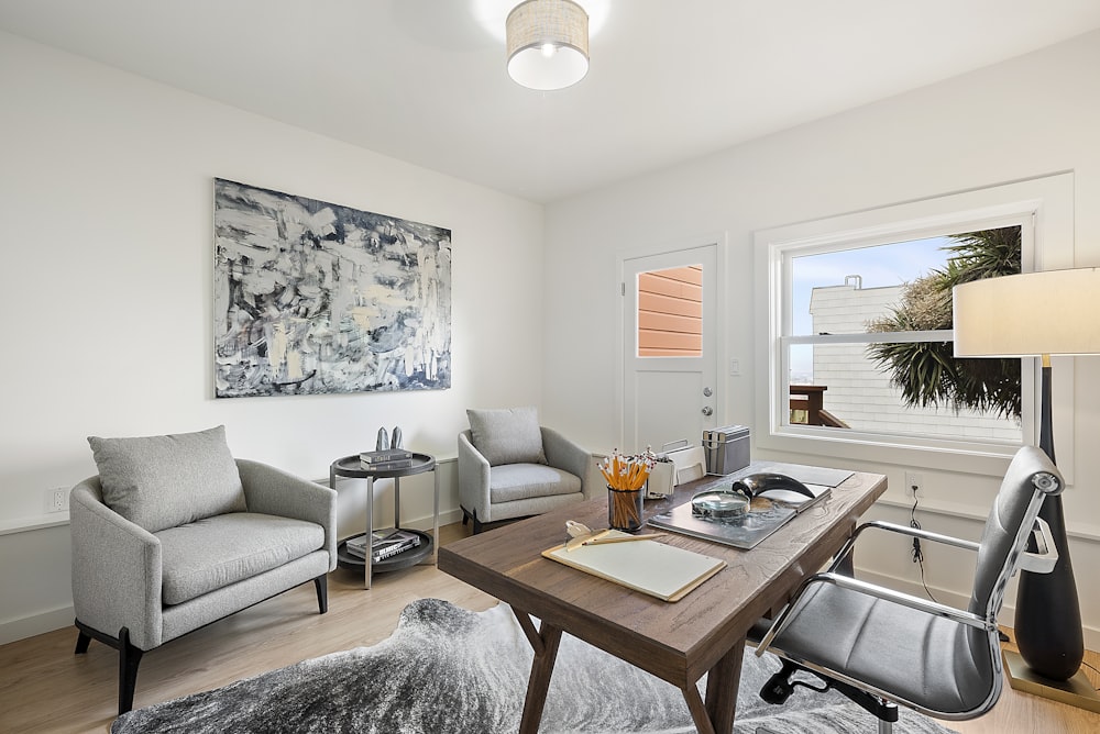 brown wooden table near white couch